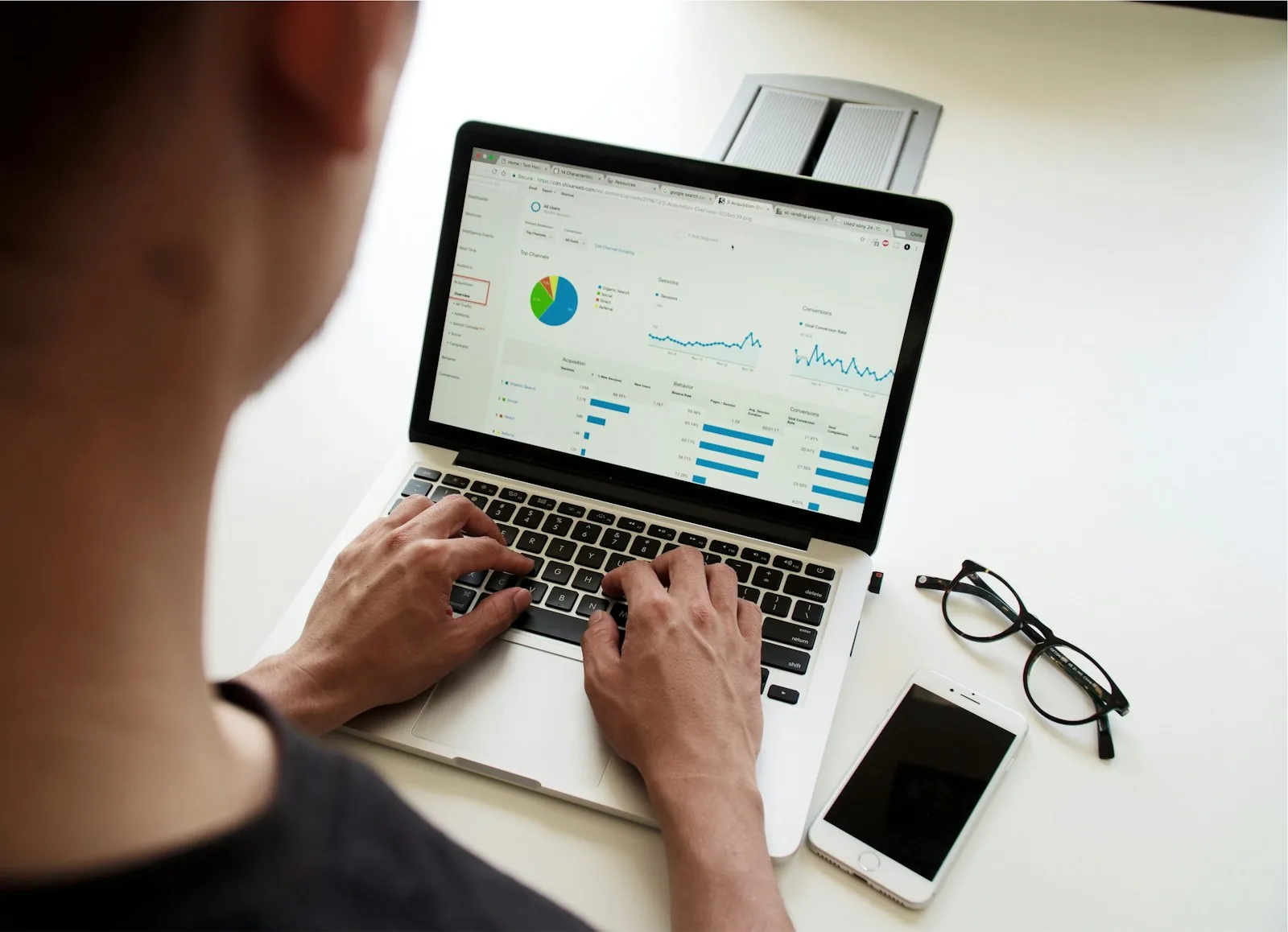 Reviewing account activity on a laptop dashboard